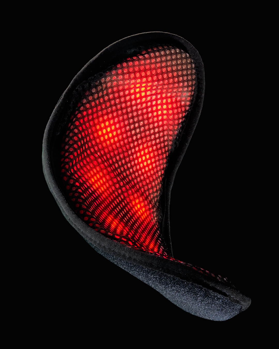 A red LED light therapy device with a mesh surface, endorsed by various publications.