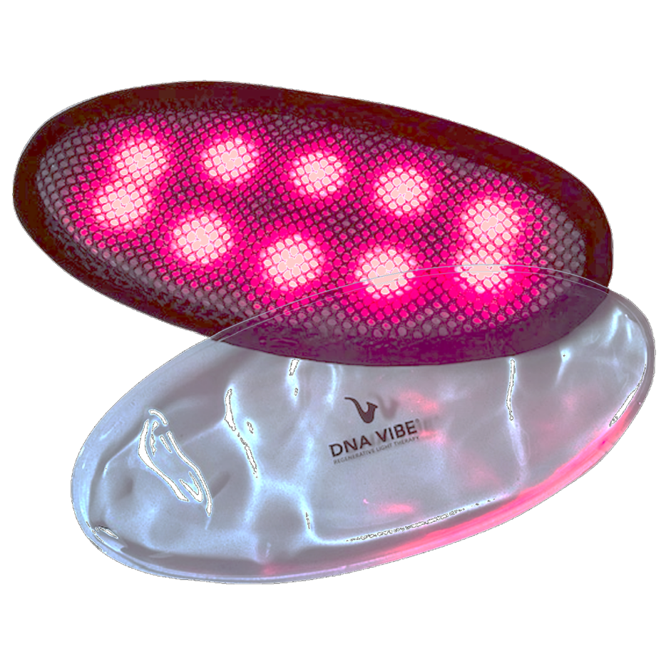 A light therapy pod emits pink lights, used for therapeutic purposes by DNA Vibe.