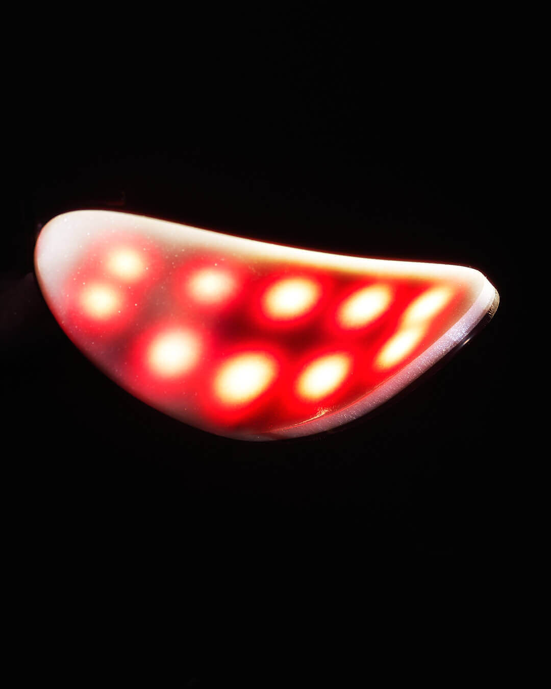 A red LED light therapy device with a mesh surface, endorsed by various publications.