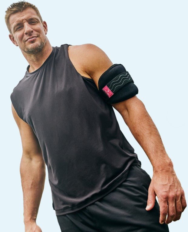 Rob Gronkowski wearing the DNA Vibe Jazz Band on his arm